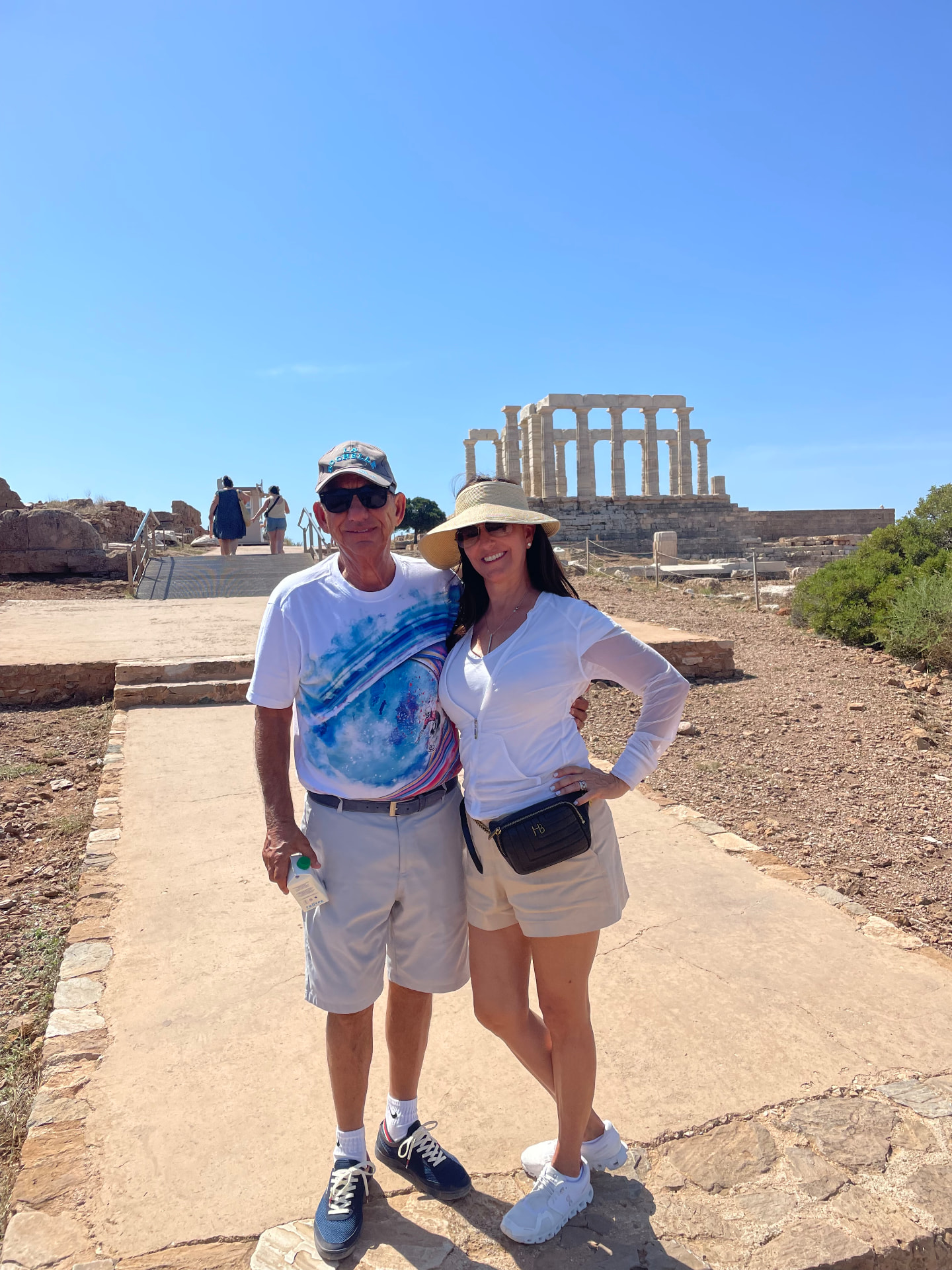 Couple at the Temple of Poseidon at Cape Sounion, Greece