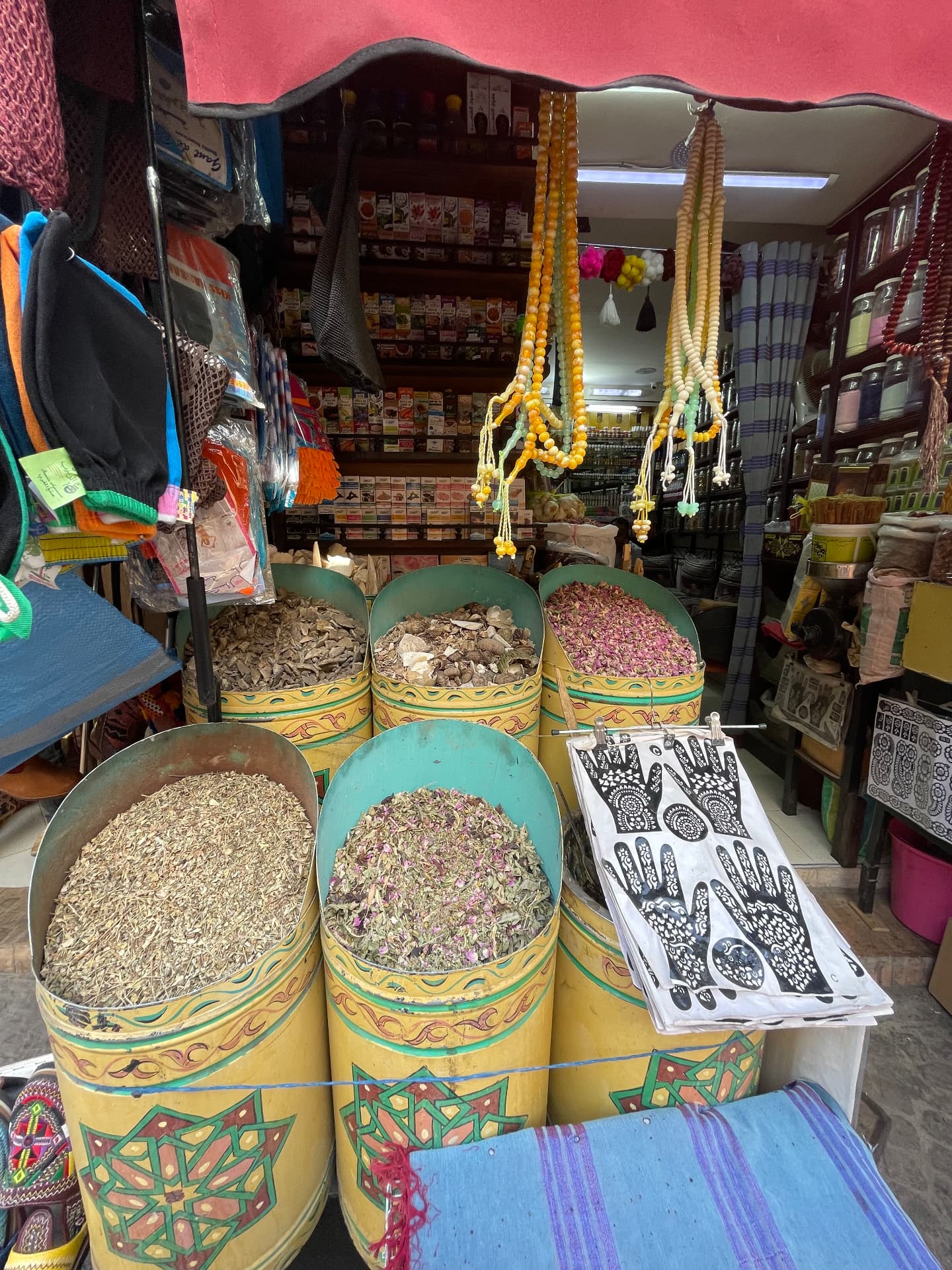Spice and henna stall in a colorful Marrakech souk